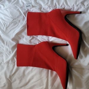 Women's size 8 red high heel NWT boots